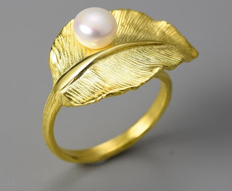 Anel Folha ajustável de prata 925 folhado a ouro 18k com pérola natural - Cuidarte Integral