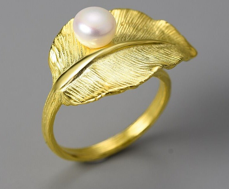 Anel Folha ajustável de prata 925 folhado a ouro 18k com pérola natural - Cuidarte Integral